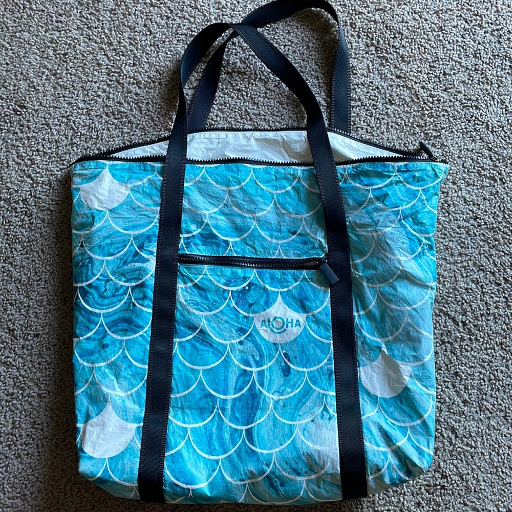 Exclusive to Sand People zipper tote